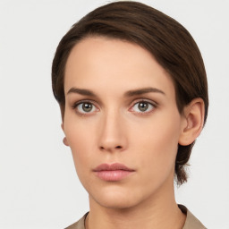 Neutral white young-adult female with short  brown hair and brown eyes