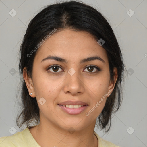 Joyful latino young-adult female with medium  brown hair and brown eyes