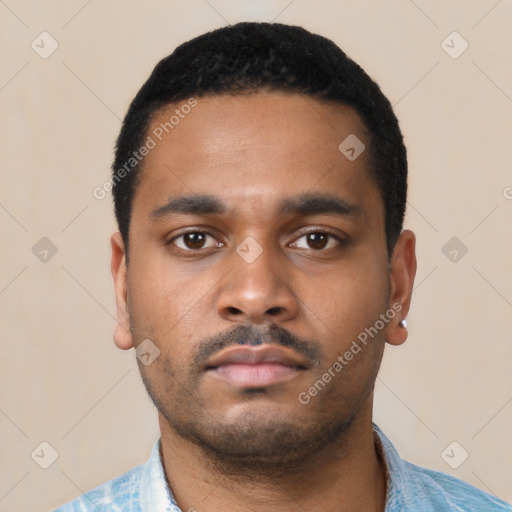 Neutral latino young-adult male with short  black hair and brown eyes