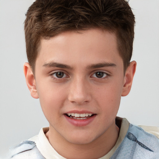 Joyful white child male with short  brown hair and brown eyes