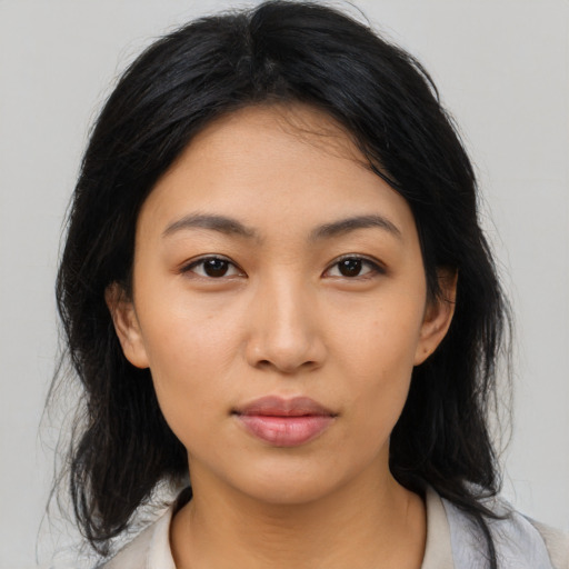 Neutral latino young-adult female with medium  black hair and brown eyes