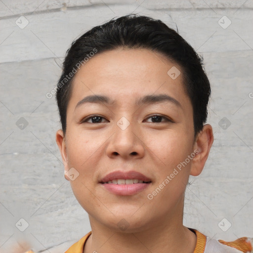 Joyful asian young-adult female with short  black hair and brown eyes