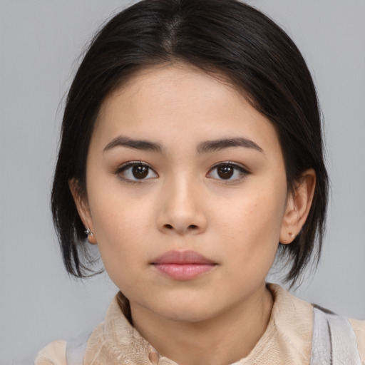 Neutral asian young-adult female with medium  black hair and brown eyes