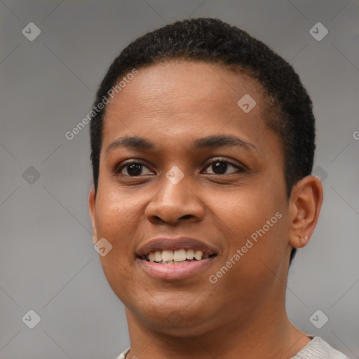 Joyful black young-adult female with short  brown hair and brown eyes