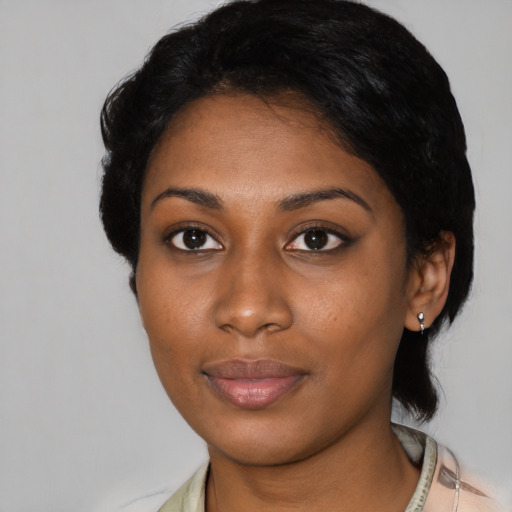 Neutral black young-adult female with short  black hair and brown eyes