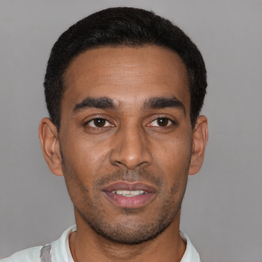 Neutral latino young-adult male with short  black hair and brown eyes