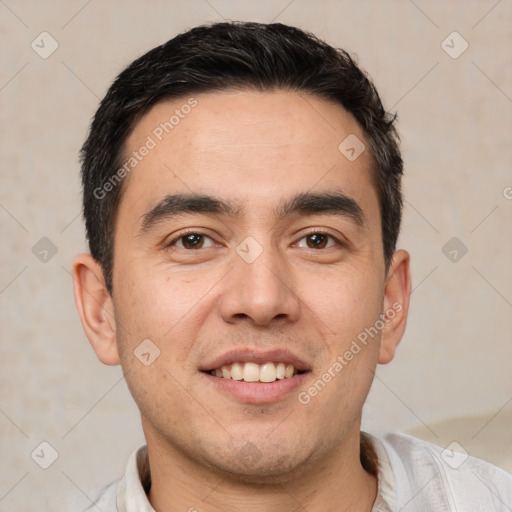 Joyful white young-adult male with short  black hair and brown eyes