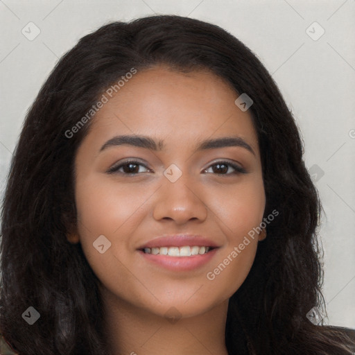 Joyful latino young-adult female with long  brown hair and brown eyes