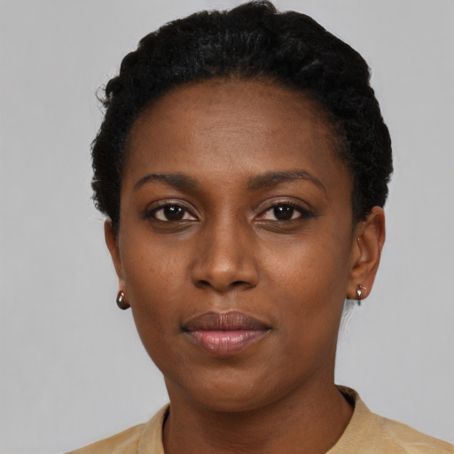 Neutral black young-adult female with short  black hair and brown eyes