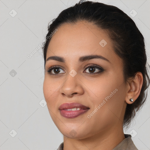 Joyful white young-adult female with long  black hair and brown eyes