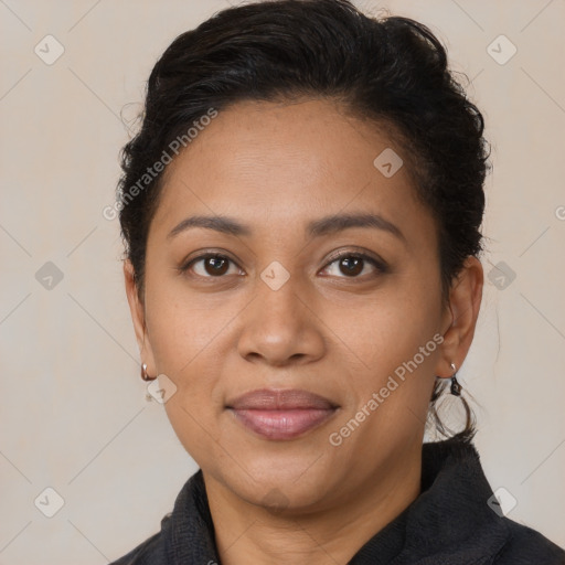 Joyful latino young-adult female with medium  brown hair and brown eyes