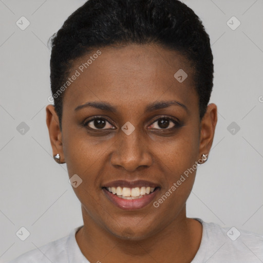 Joyful black young-adult female with short  black hair and brown eyes