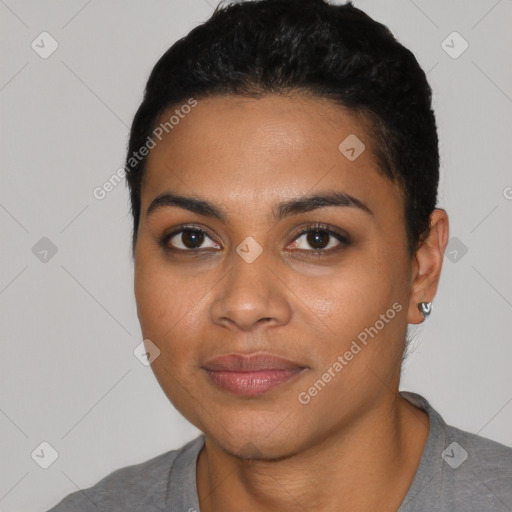 Joyful latino young-adult female with short  black hair and brown eyes