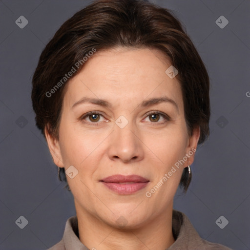 Joyful white adult female with short  brown hair and brown eyes