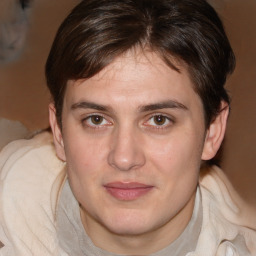 Joyful white young-adult male with medium  brown hair and brown eyes