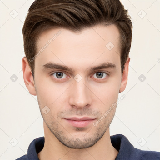 Neutral white young-adult male with short  brown hair and grey eyes