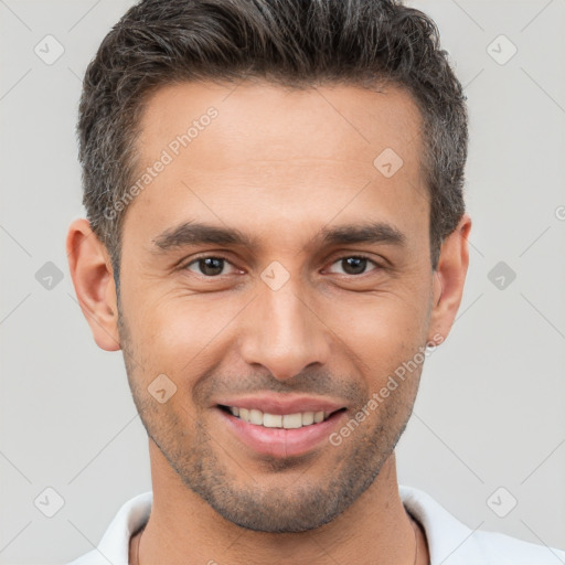 Joyful white young-adult male with short  brown hair and brown eyes