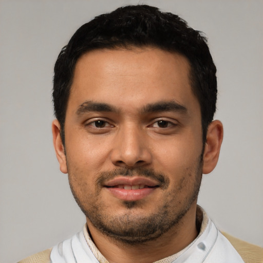 Neutral latino young-adult male with short  black hair and brown eyes