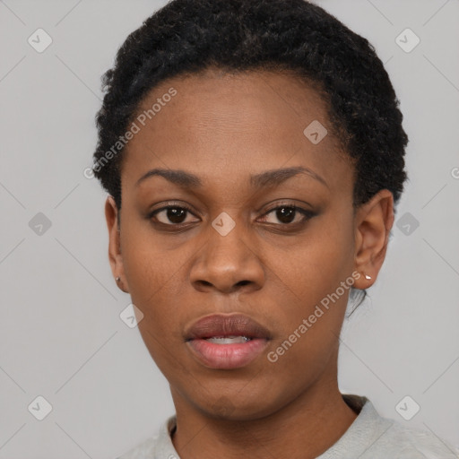 Neutral black young-adult female with short  black hair and brown eyes