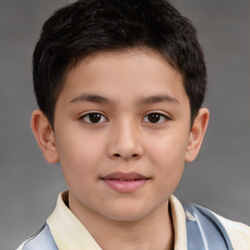 Joyful white child male with short  brown hair and brown eyes