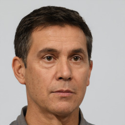 Neutral white adult male with short  brown hair and brown eyes