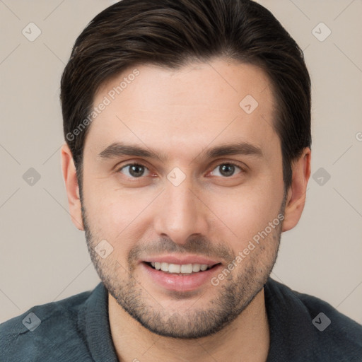 Joyful white young-adult male with short  brown hair and brown eyes