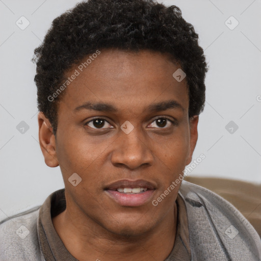 Joyful black young-adult male with short  brown hair and brown eyes