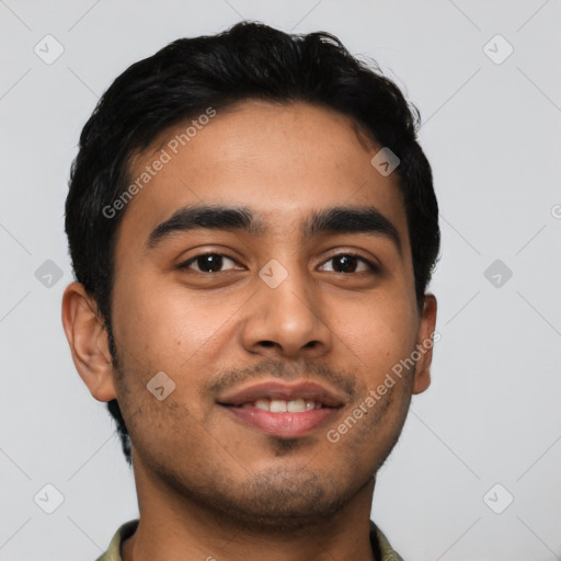 Joyful latino young-adult male with short  black hair and brown eyes