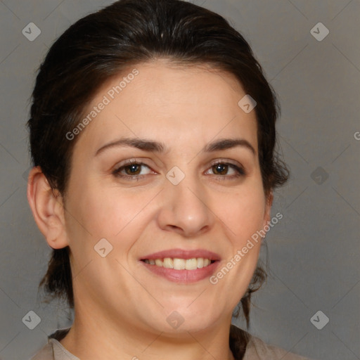 Joyful white adult female with medium  brown hair and brown eyes