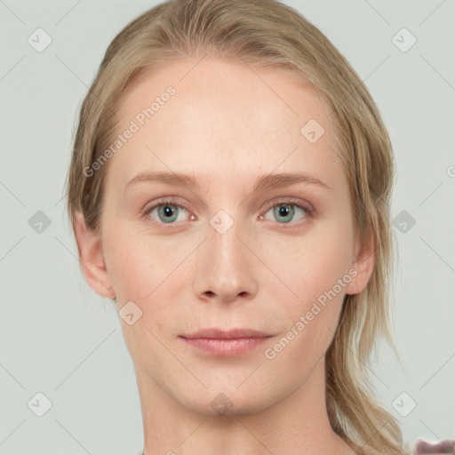 Joyful white young-adult female with medium  brown hair and blue eyes