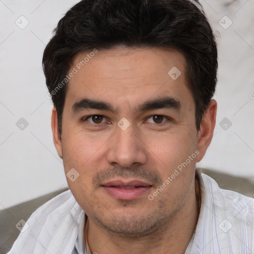 Joyful white young-adult male with short  black hair and brown eyes