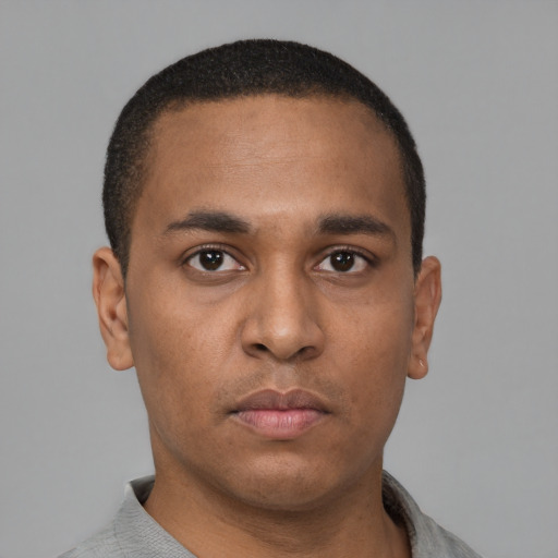 Neutral latino young-adult male with short  brown hair and brown eyes