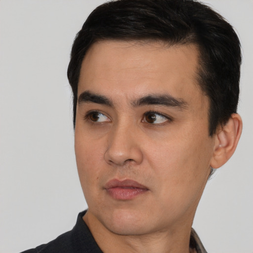 Neutral white young-adult male with short  black hair and brown eyes