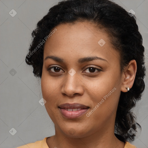 Joyful black young-adult female with medium  black hair and brown eyes