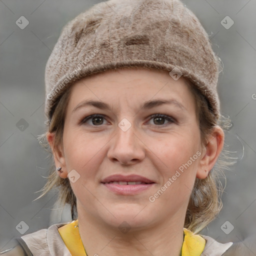 Joyful white young-adult female with medium  brown hair and grey eyes