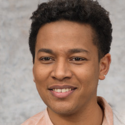 Joyful latino young-adult male with short  brown hair and brown eyes