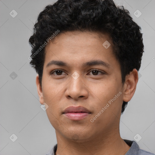 Neutral latino young-adult male with short  brown hair and brown eyes