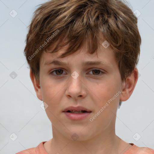 Joyful white child male with short  brown hair and brown eyes