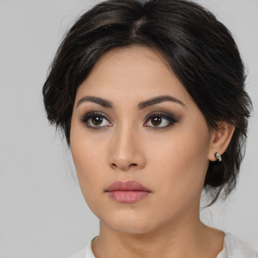 Neutral asian young-adult female with medium  black hair and brown eyes