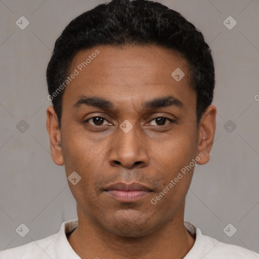 Neutral latino young-adult male with short  black hair and brown eyes