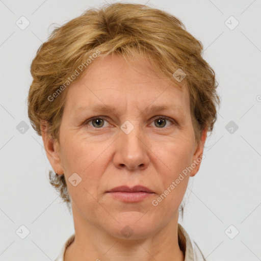 Joyful white adult female with short  brown hair and grey eyes