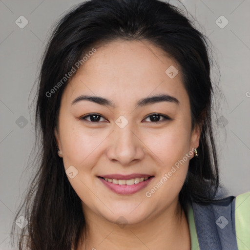 Joyful asian young-adult female with long  brown hair and brown eyes