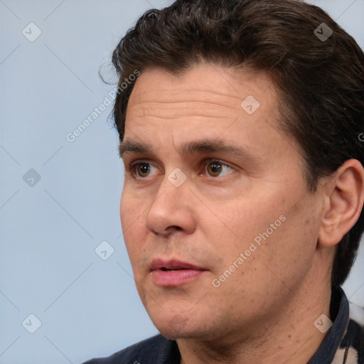 Neutral white adult male with short  brown hair and brown eyes