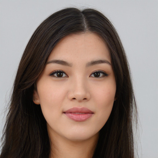 Neutral asian young-adult female with long  brown hair and brown eyes