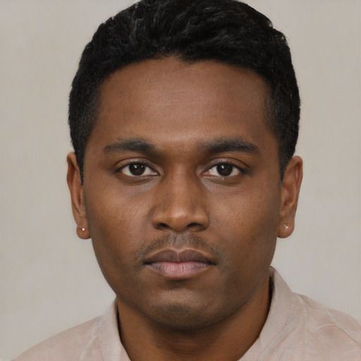 Neutral black young-adult male with short  black hair and brown eyes