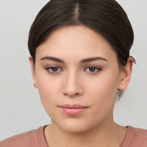 Neutral white young-adult female with short  brown hair and brown eyes