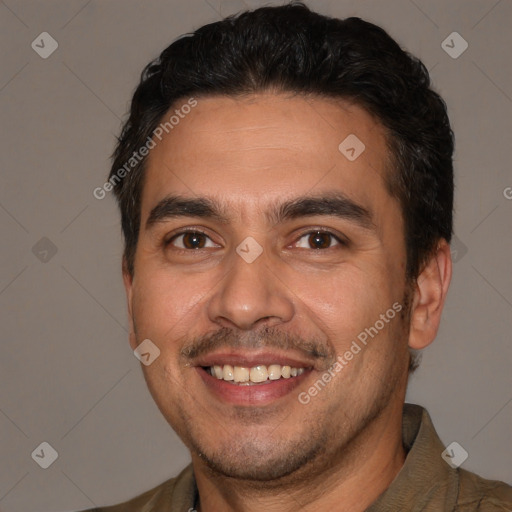 Joyful white young-adult male with short  black hair and brown eyes