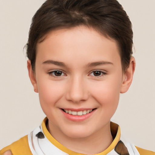 Joyful white child female with short  brown hair and brown eyes