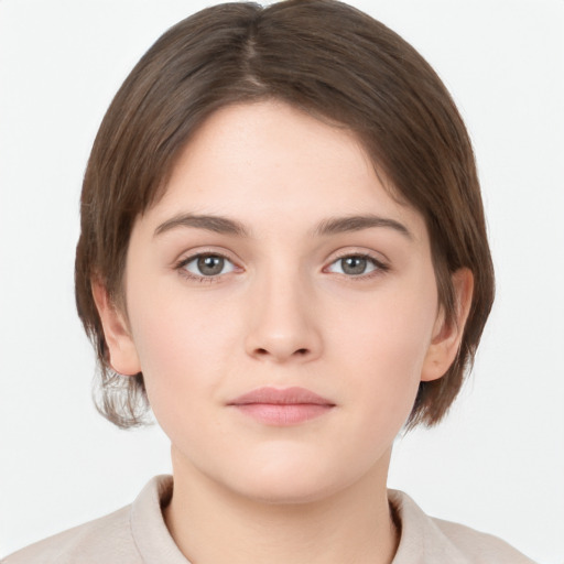 Neutral white young-adult female with medium  brown hair and brown eyes