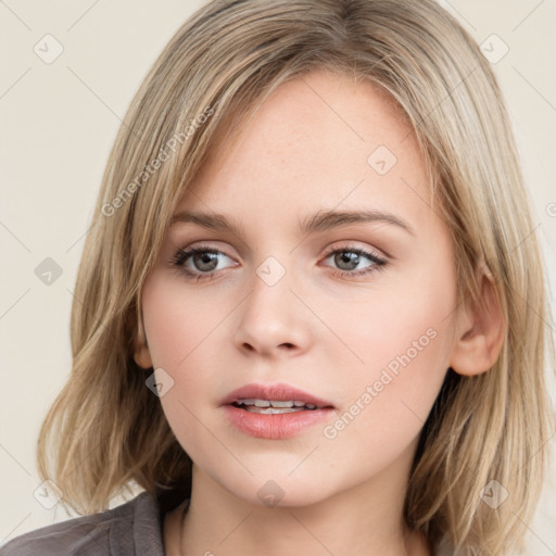 Neutral white young-adult female with medium  brown hair and grey eyes